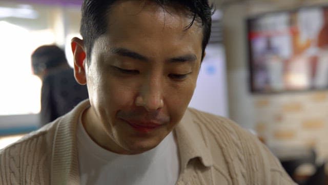 Man enjoying a meal indoors