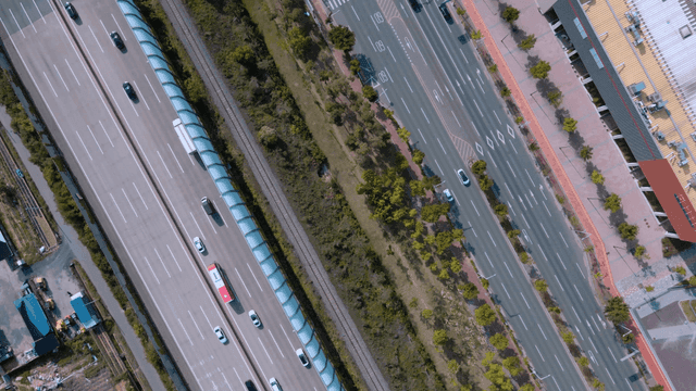 Highway with many cars passing by