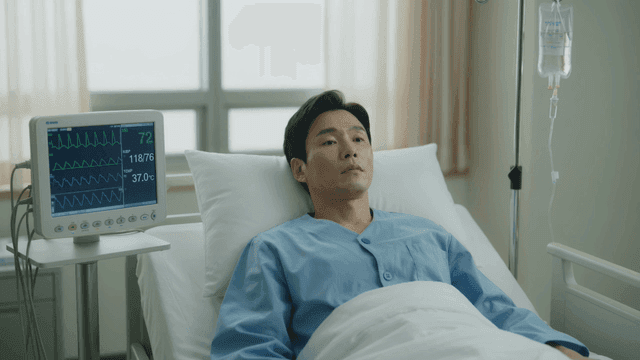 Patient lying in hospital bed