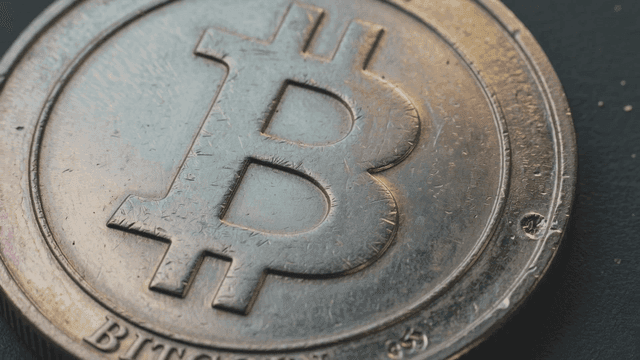 Close-up of a Bitcoin coin surface