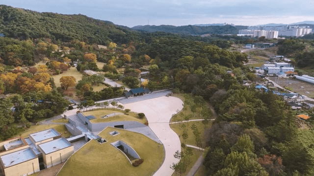 Scenic view of a park with autumn foliage