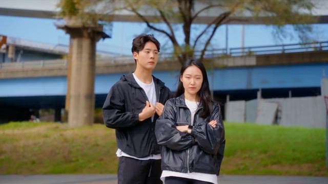 Couple standing outdoors in casual wear