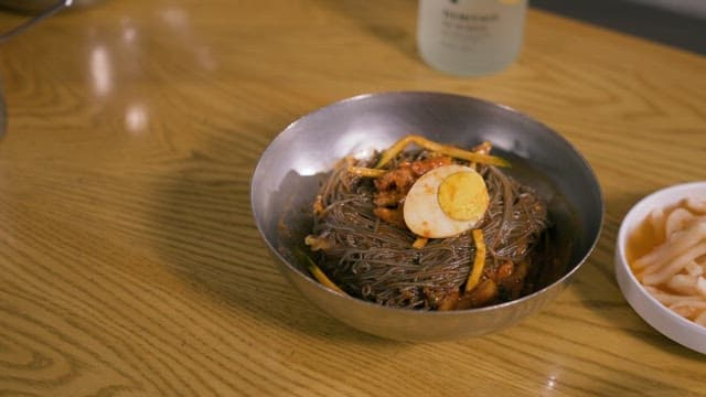 Savory Cold Noodles and Chopped Raddish on Table