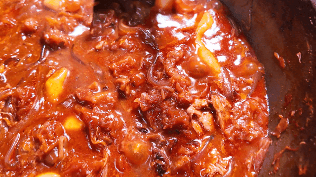 Spicy braised pork ribs with rice cakes and glass noodles