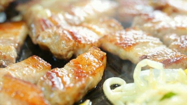 Sizzling Pork Belly on a Grill