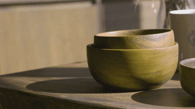 Wooden bowls stacked on a table
