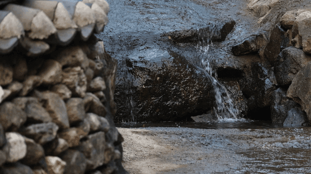 Small waterfall flowing over rocks