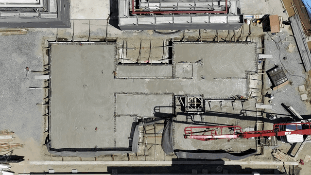 Construction site with workers and machinery