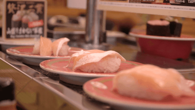 Sushi plates on a conveyor belt