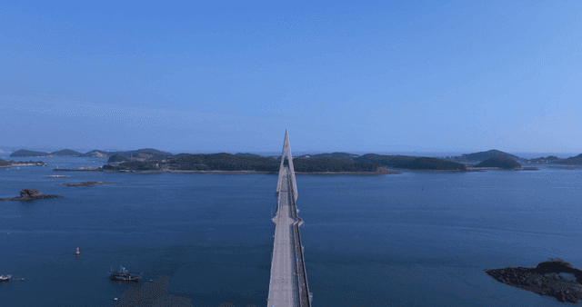 Long bridge stretching over sea