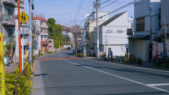 Quiet Street in a Residential Area with Cars