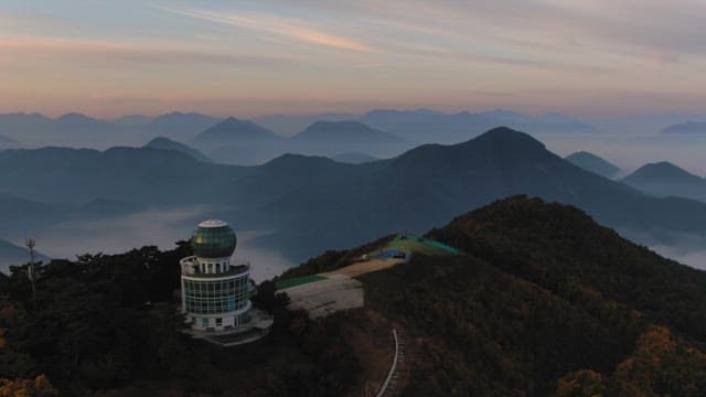 Observatory atop a mountain during twilight