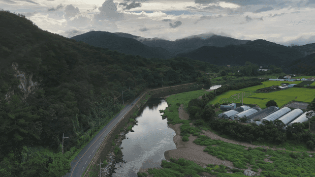 Peaceful countryside scenery with mountains and rivers