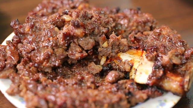 Juicy tteokgalbi on a plate