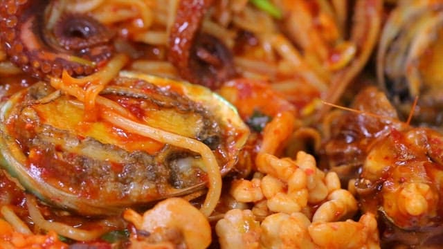 Spicy braised seafood dish with abalone and octopus