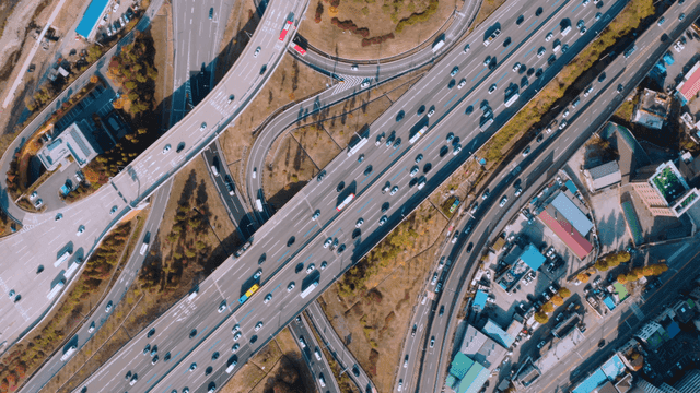 A busy highway intersection with cars
