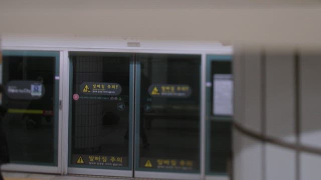 Person waiting for the subway at a station