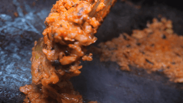 Kimchi fried rice being cooked in a pan