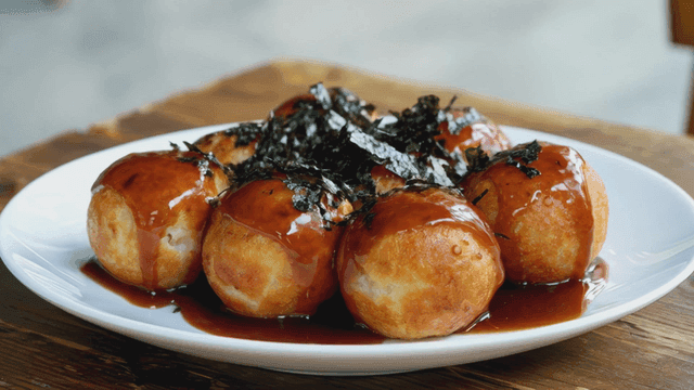 Takoyaki balls with sauce and seaweed
