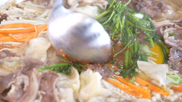 Stew with vegetables and dumplings that is seasoned well
