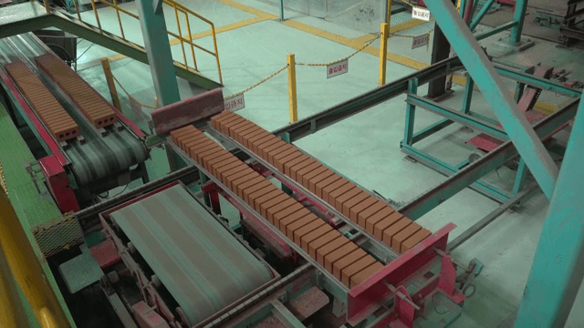 Bricks on a conveyor belt in a factory