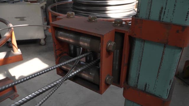 Metal wire being processed in a factory