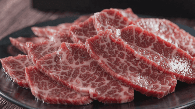 Slices of marbled beef on a plate