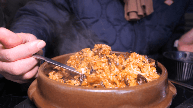 Bowl of steaming kimchi bibimbap