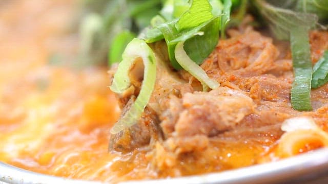 Pork backbone stew with fresh vegetables