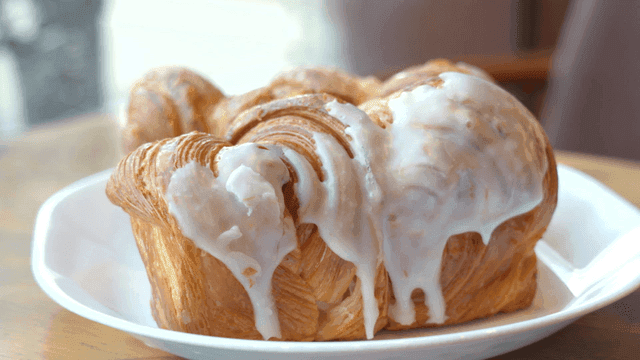 Glazed pastry on a white plate