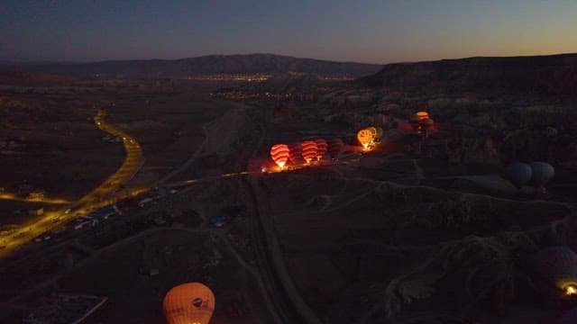 Hot Air Balloons Preparing for Flight at Dawn