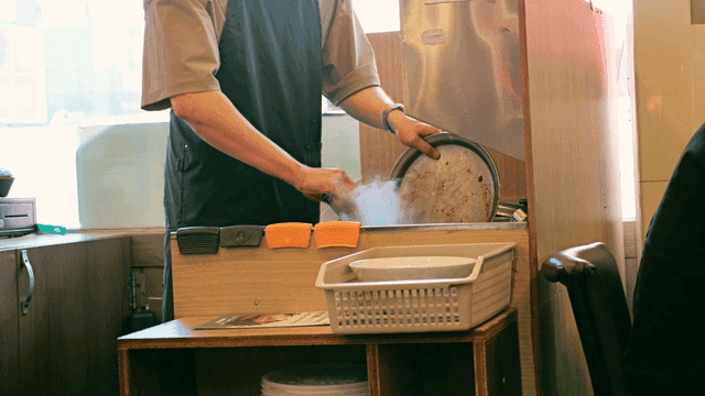 Person cooking dakgalbi in kitchen