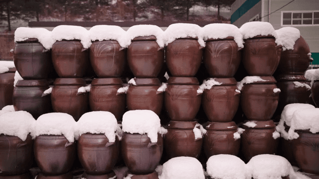 Snow-covered traditional Korean jars