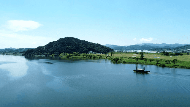 Quiet river with mountains and Panokseon ships