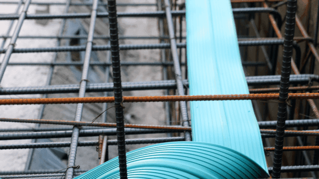Construction site with steel rebar and cables