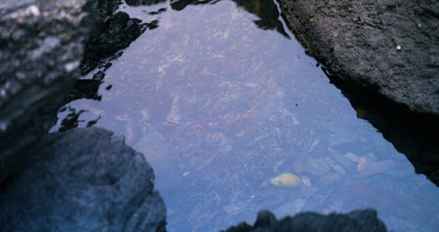 Clear Sea Water Between Rocks