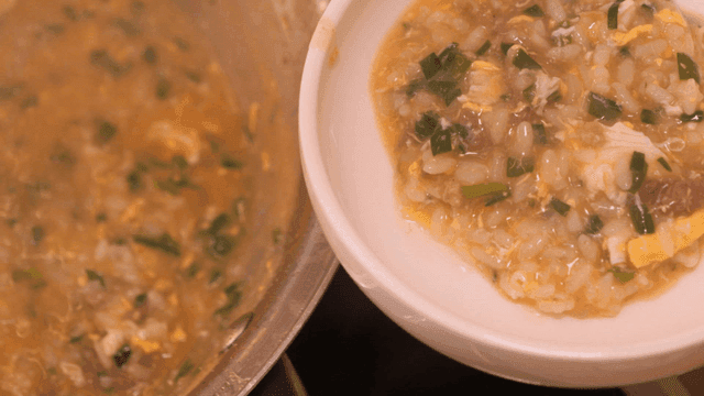 Rich hot pot porridge served in bowl