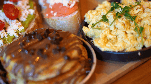 Variety of breakfast dishes on a table