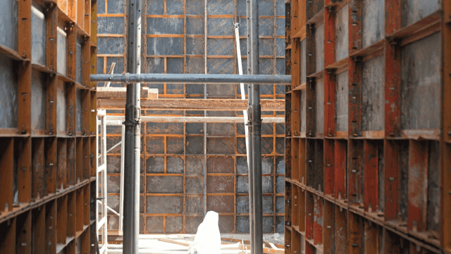 Inside a construction site with scaffolding