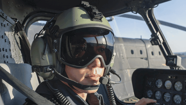 Pilot in a helicopter cockpit