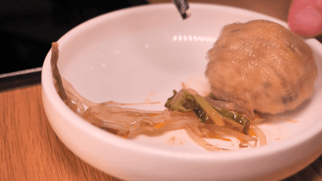 Plate containing rolled dumplings