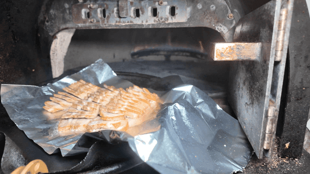 Grilled Bossam on hot plate, taken out of oven