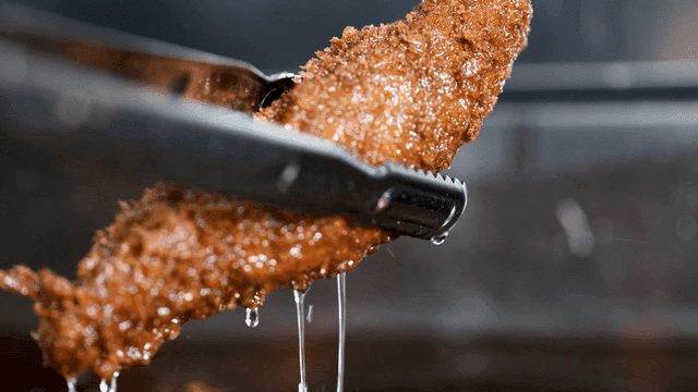 Fried shrimp taken out of hot oil