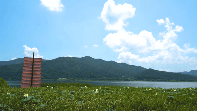 Serene lake with mountains in the background