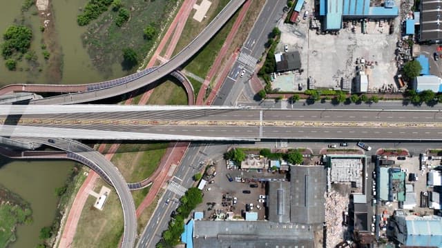 Cars driving on a bridge over water