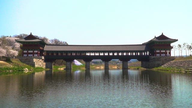 Woljeonggyo Bridge, built in a traditional Korean structure on a calm river