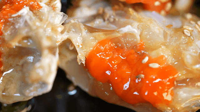 Fresh soy sauce marinated crab with orange intestines and roe