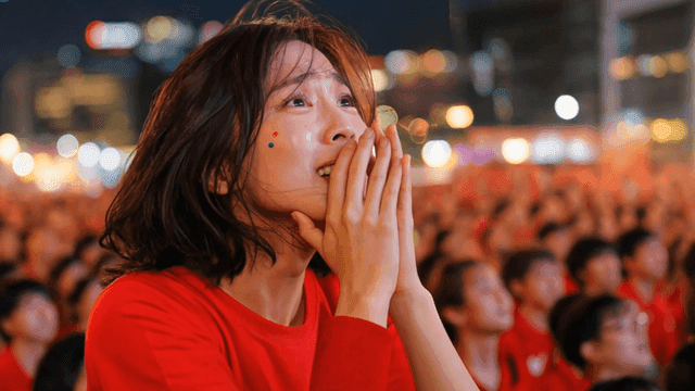 Woman who got excited watching sports game