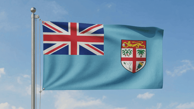 Fiji flag fluttering under clear sky