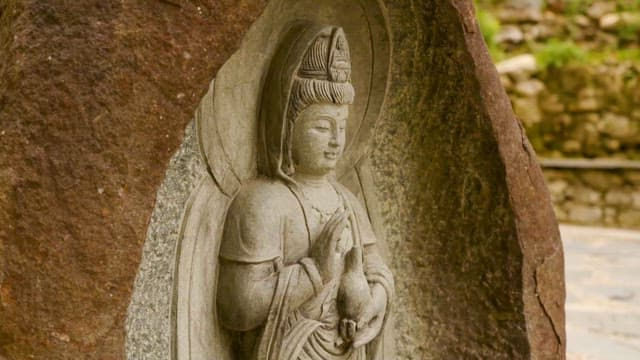 Serene Stone Buddha Statue at a Temple